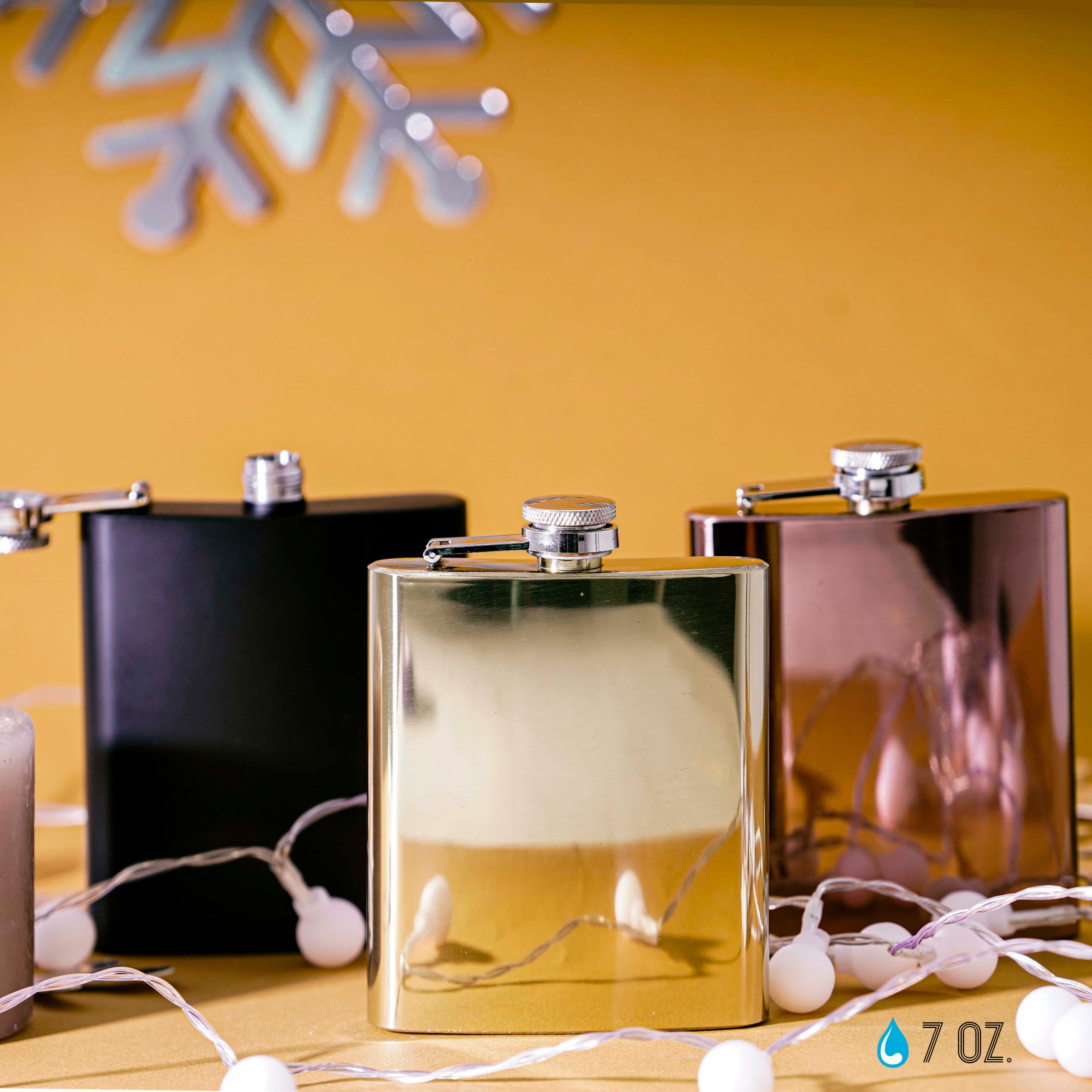 Licorera de bolsillo de acero inoxidable con tapa enroscable. DORADO