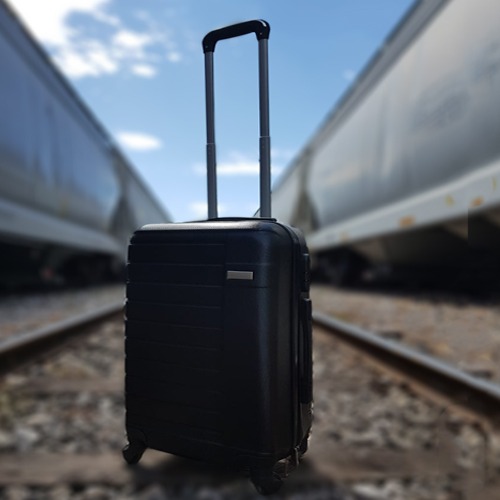 Maleta de plástico para viaje, con ruedas giratorias, asa metálica retráctil y candado de seguridad. NEGRO