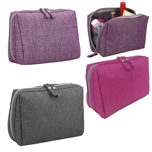 Cosmetiquera con 5 compartimentos internos. GRIS