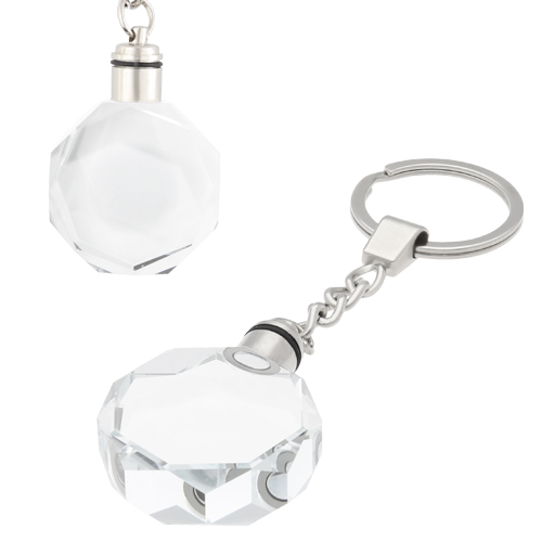 Llavero con diseño en forma de octágono y luz blanca. Incluye 3 baterías AG1. TRANSPARENTE