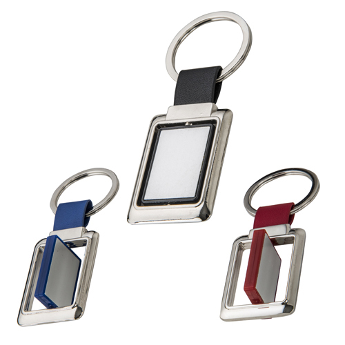 Llavero metálico de forma rectangular con centro de color, giratorio, cinta y arillo reforzado para colgar. AZUL