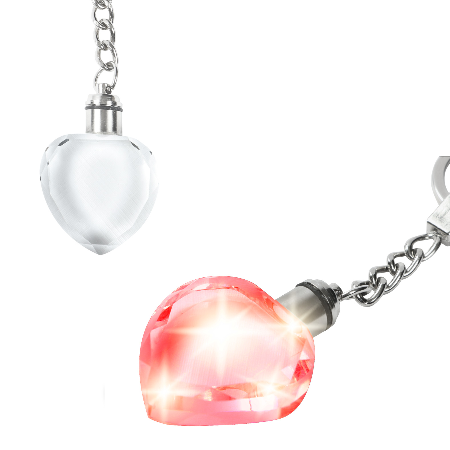 Llavero con diseño en forma de corazón, luz roja y aro reforzado. Incluye 3 baterías AG1. TRANSPARENTE